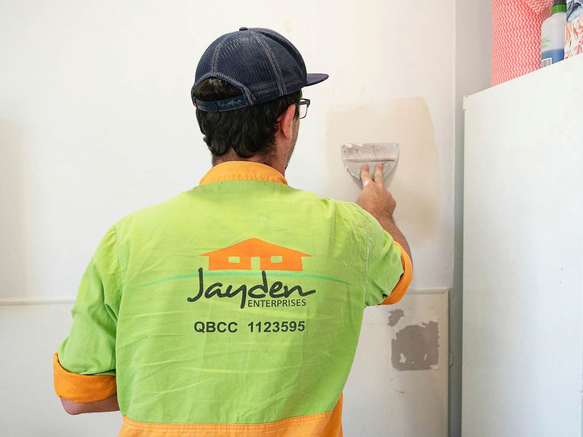Plasterer Patching a Wall — Jayden Enterprises in Mackay, QLD