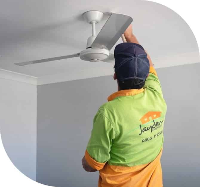 Electrician Repairing Ceiling Fan — Jayden Enterprises in Mackay, QLD